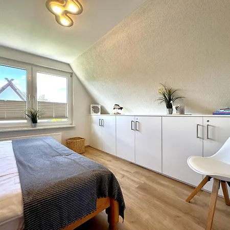 펜션 Ferienhaeuser Strandhaus Duenenwind 부스트로우