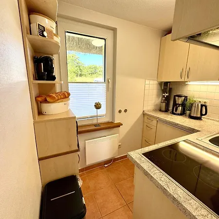 펜션 Ferienhaeuser Strandhaus Duenenwind *